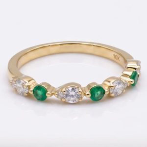 Anillo de diamantes y esmeraldas naturales